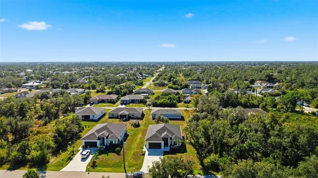 an aerial view of multiple house