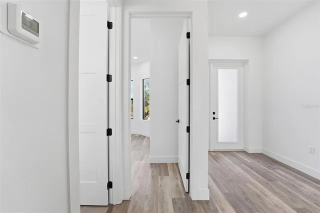 a view of a bathroom with wooden floor