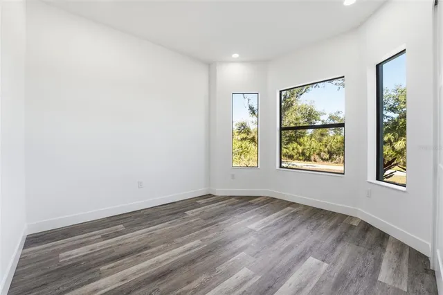 an empty room with windows