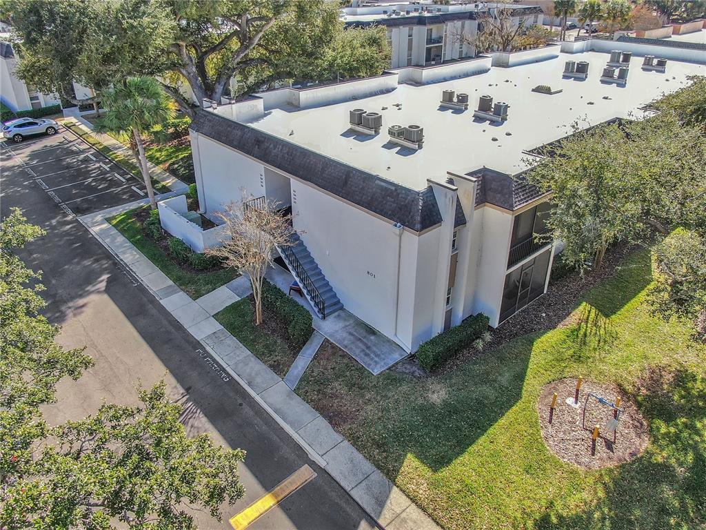 801 Russell Lane, Unit 255 Brandon, FL 33510 - Photo 22 of 22 a view of a house with a yard and potted plants