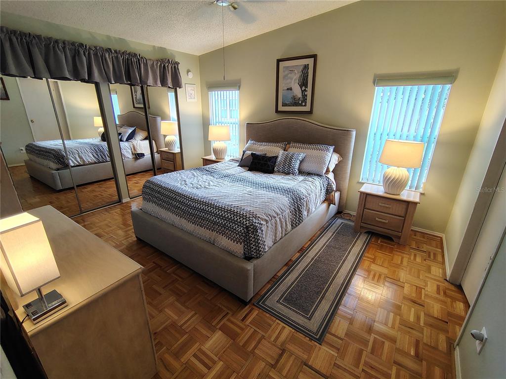 116 Lyonia Lane Wildwood, FL 34785 - Photo 12 of 37 a bedroom with bed and window