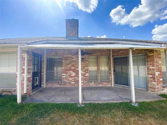 a view of a porch with a yard