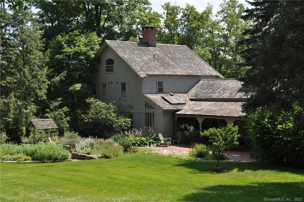 72 Wellers Bridge Road Roxbury, CT 06783 - Photo 1 of 1 a front view of house with a garden