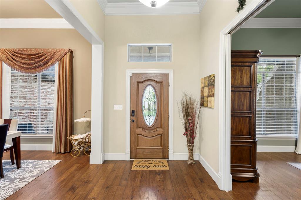 105 Country Ridge Court Red Oak, TX 75154 - Photo 6 of 40 a view of walk in closet with wooden floor