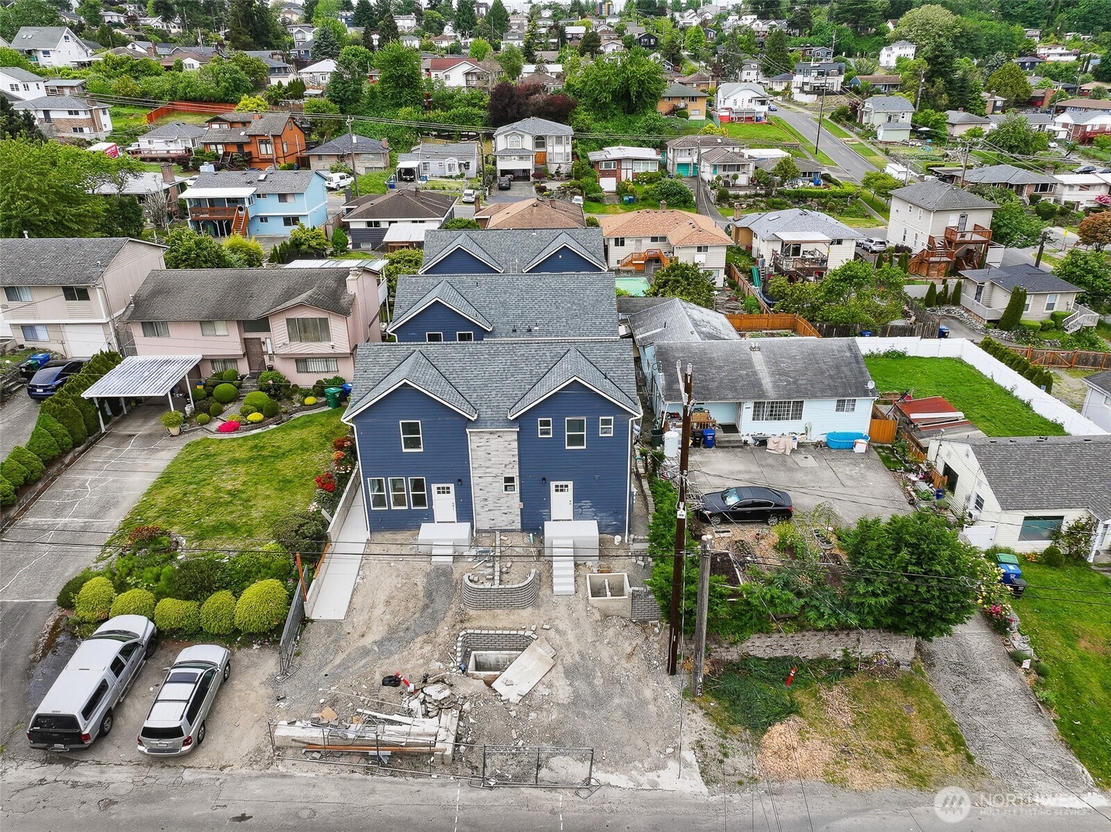 2317 22nd Avenue South Seattle, WA 98144 - Photo 4 of 29 an aerial view of a house with a yard garage and lake view