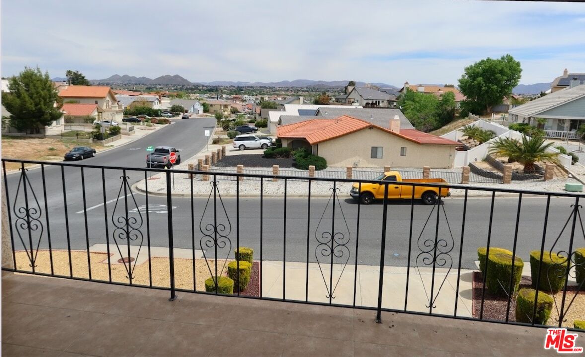 13330 Tamarisk Road Victorville, CA 92395 - Photo 7 of 33 a view of a balcony with an outdoor seating