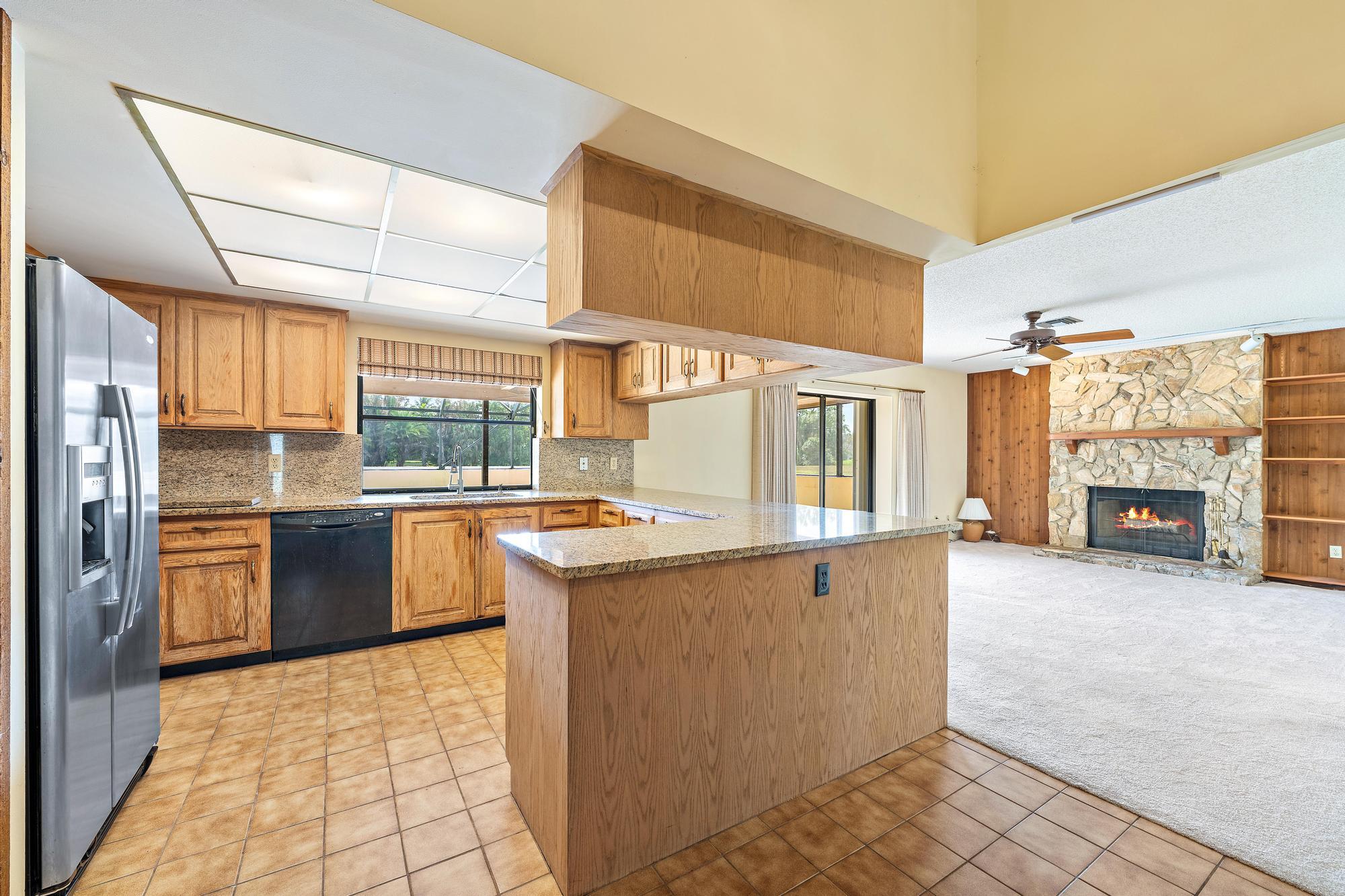 8090 Native Dancer Road East Palm Beach Gardens, FL 33418 - Photo 12 of 26 KItchen