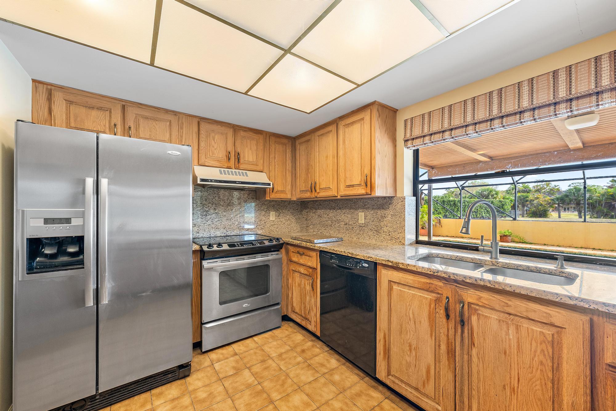8090 Native Dancer Road East Palm Beach Gardens, FL 33418 - Photo 13 of 26 KItchen