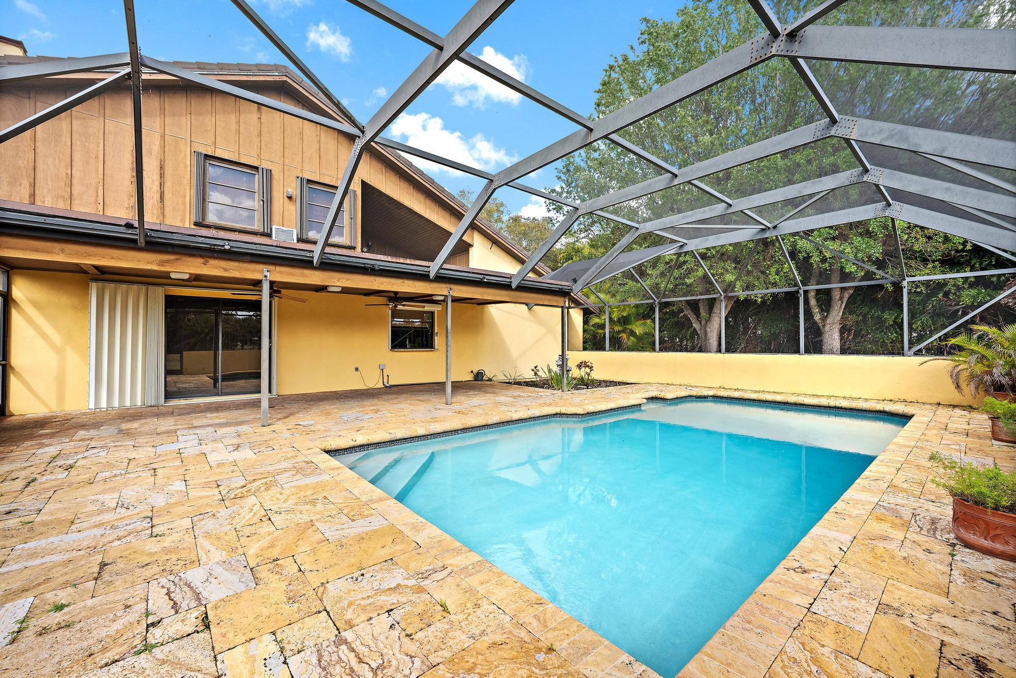 8090 Native Dancer Road East Palm Beach Gardens, FL 33418 - Photo 19 of 26 Screened In Pool