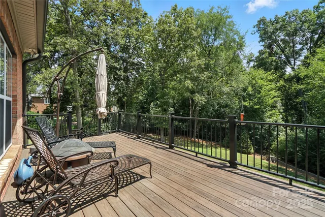 a view of a patio with two chairs and a table