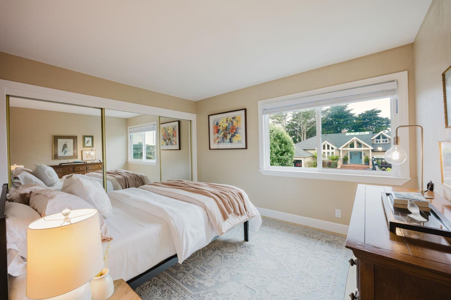 2329 Burning Tree Road Half Moon Bay, CA 94019 - Photo 22 of 35 a bedroom with a bed and a window