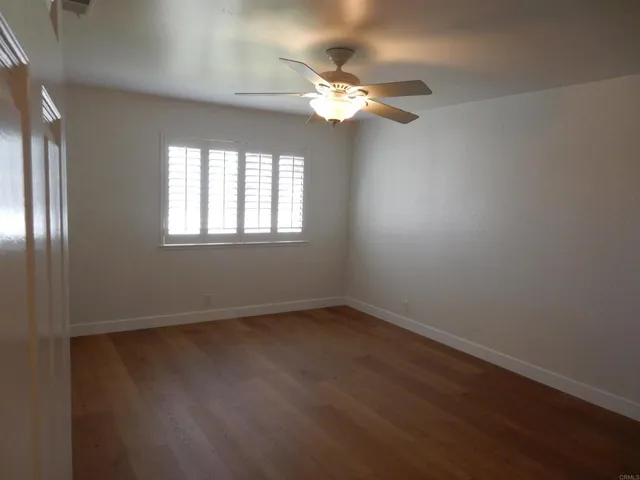 a bathroom with a double vanity sink mirror and shower