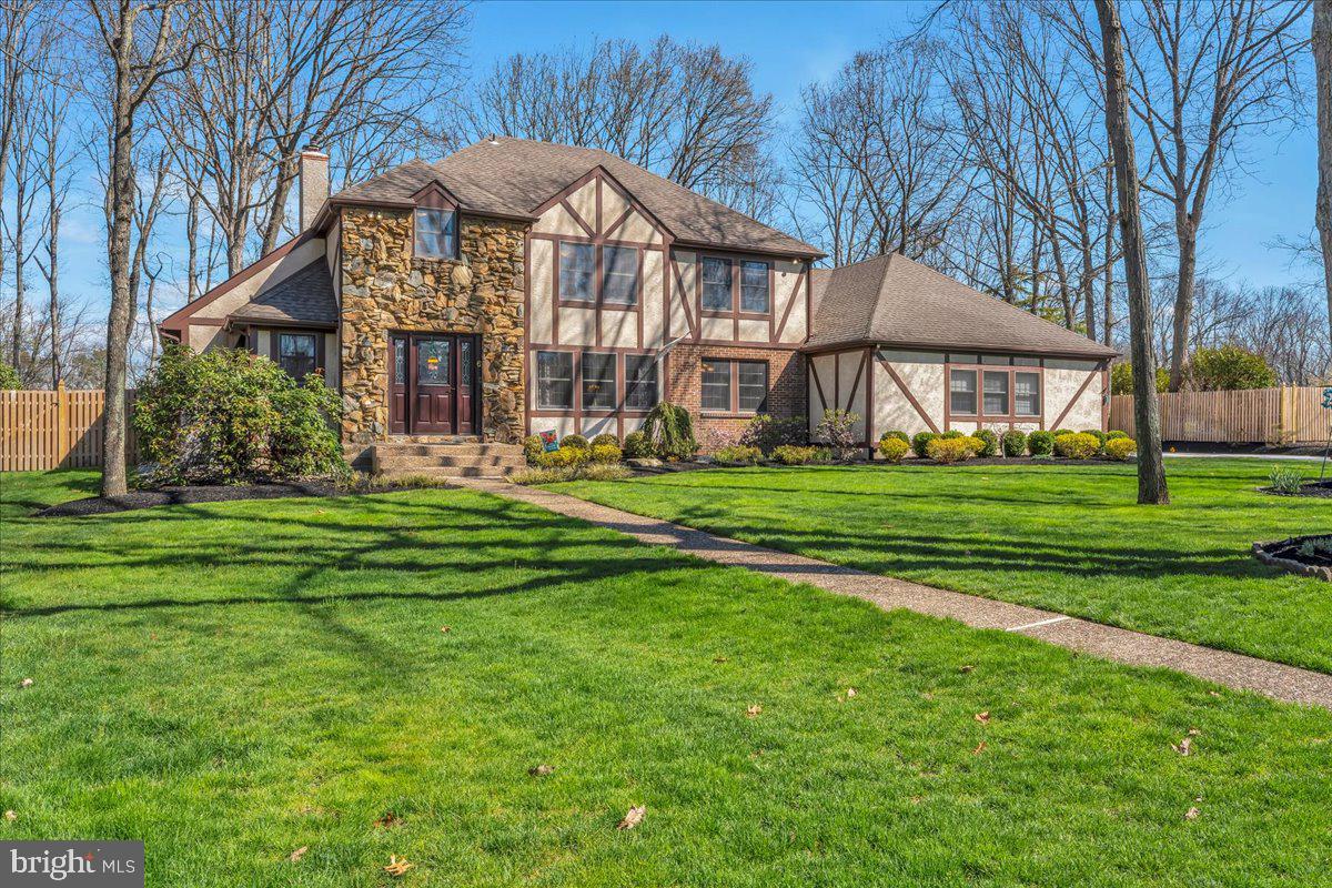 6 Edelweiss Lane Voorhees, NJ 08043 - Photo 1 of 46 a front view of a house with a yard