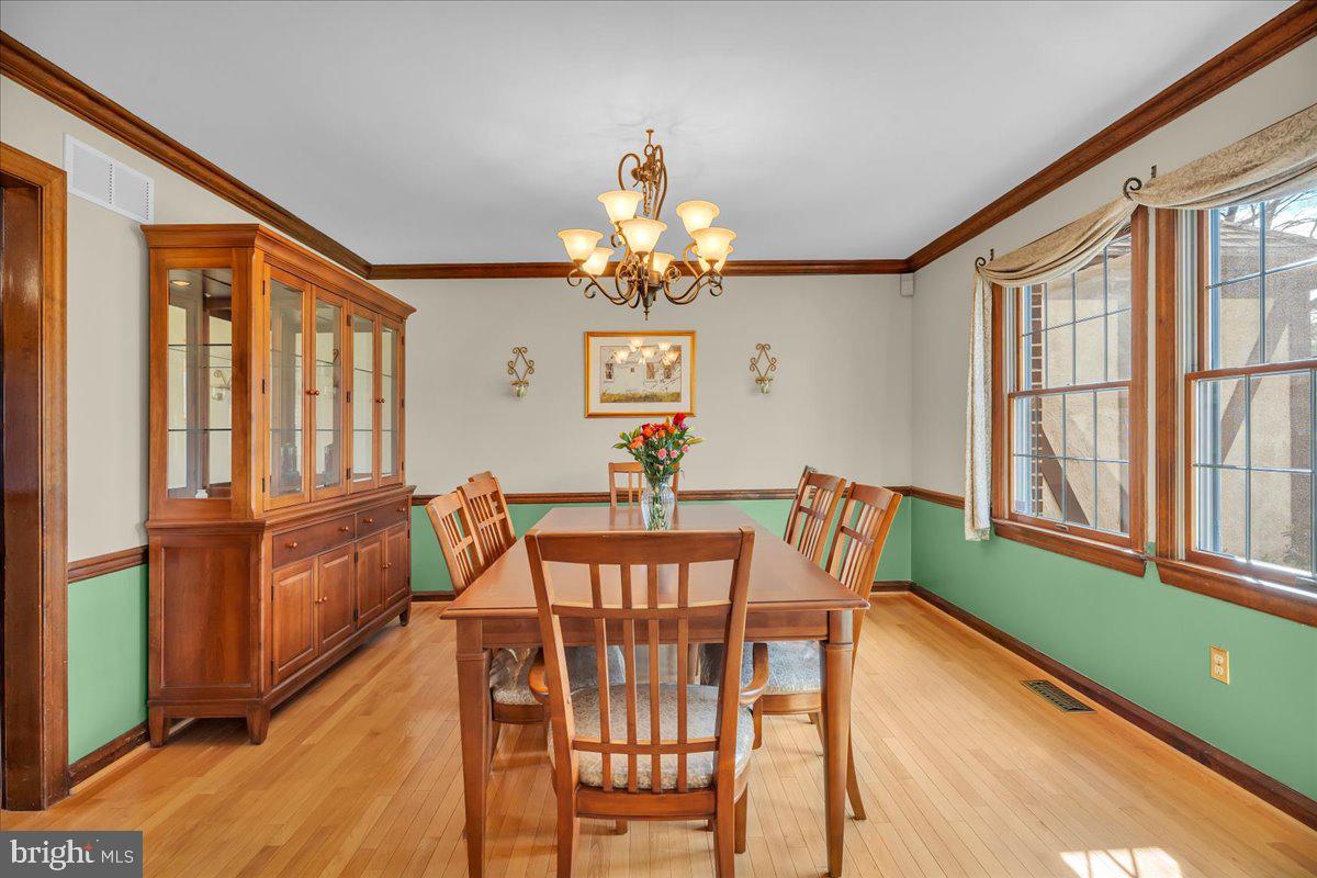 6 Edelweiss Lane Voorhees, NJ 08043 - Photo 13 of 46 a view of a dining room with furniture window and wooden floor