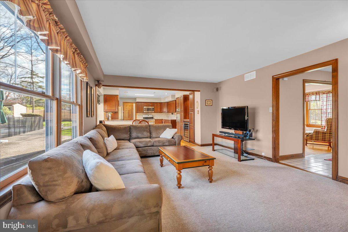 6 Edelweiss Lane Voorhees, NJ 08043 - Photo 15 of 46 a living room with furniture and a flat screen tv