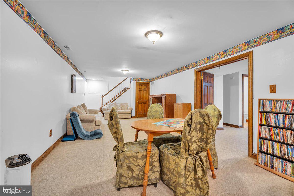 6 Edelweiss Lane Voorhees, NJ 08043 - Photo 17 of 46 a dining room with furniture and stairs