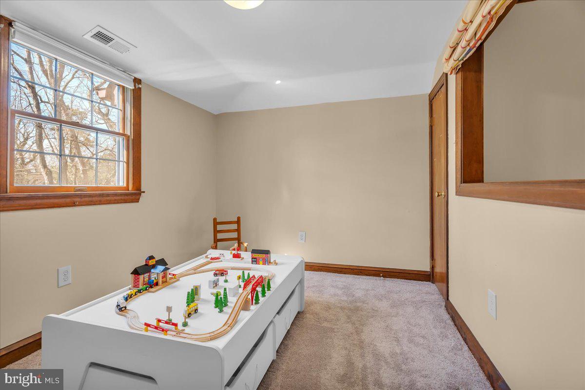 6 Edelweiss Lane Voorhees, NJ 08043 - Photo 23 of 46 a room with toys and wooden floor