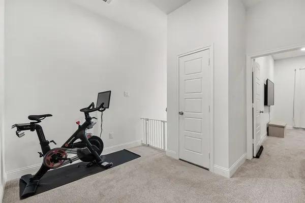 a view of a room with gym equipment