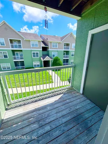 a view of front door with a house
