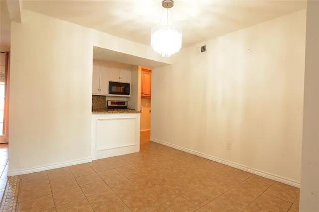 a view of a livingroom and a flat screen tv