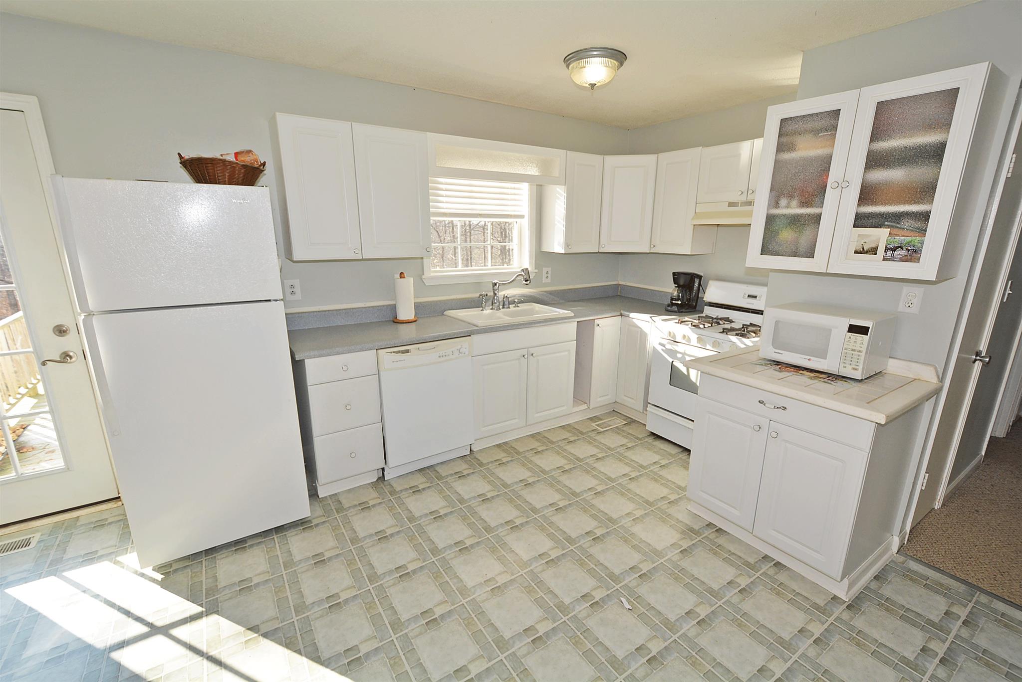 3692 Reed Road Indian Mound, TN 37079 - Photo 3 of 11 Large open kitchen with great additional cabinet space & amazing natural light!