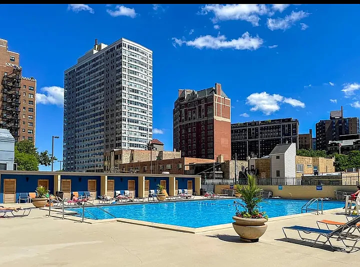 655 West Irving Park Road, Unit 5108 Chicago, IL 60613 - Photo 7 of 13 a view of building with street view