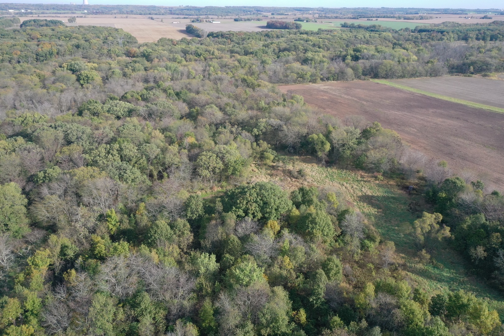 0 South Prairie Road Chana, IL 61015 - Photo 3 of 40 an aerial view of mountains with green space