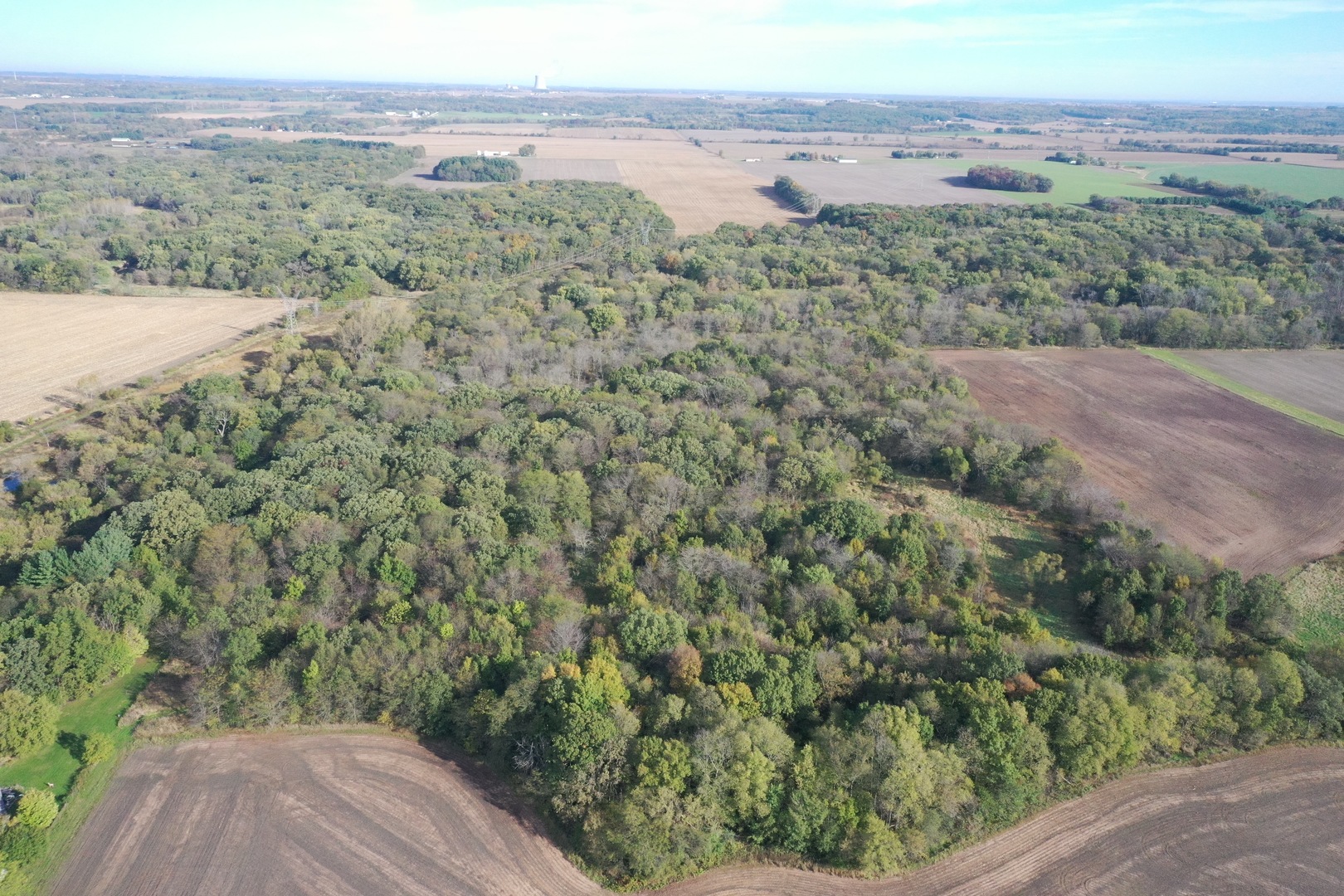 0 South Prairie Road Chana, IL 61015 - Photo 5 of 40 an aerial view of mountain with trees in the background