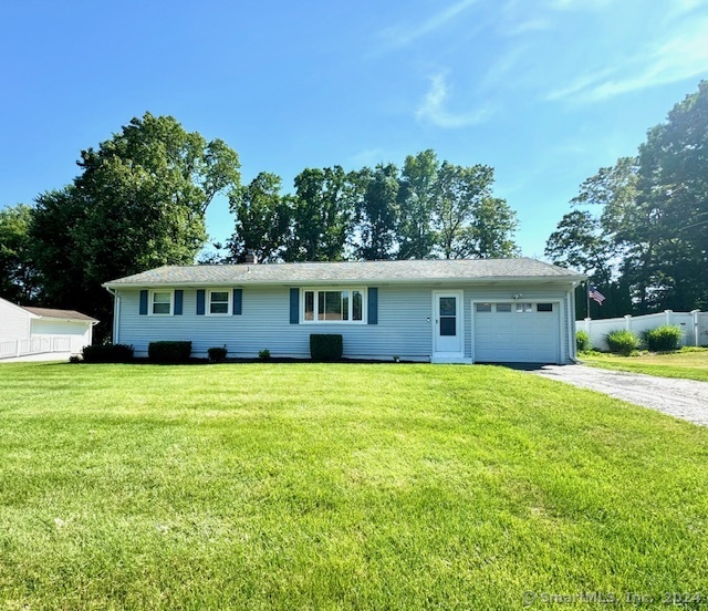 630 6th Ridge Road Wallingford, CT 06492 - Photo 1 of 1 a front view of a house with a garden