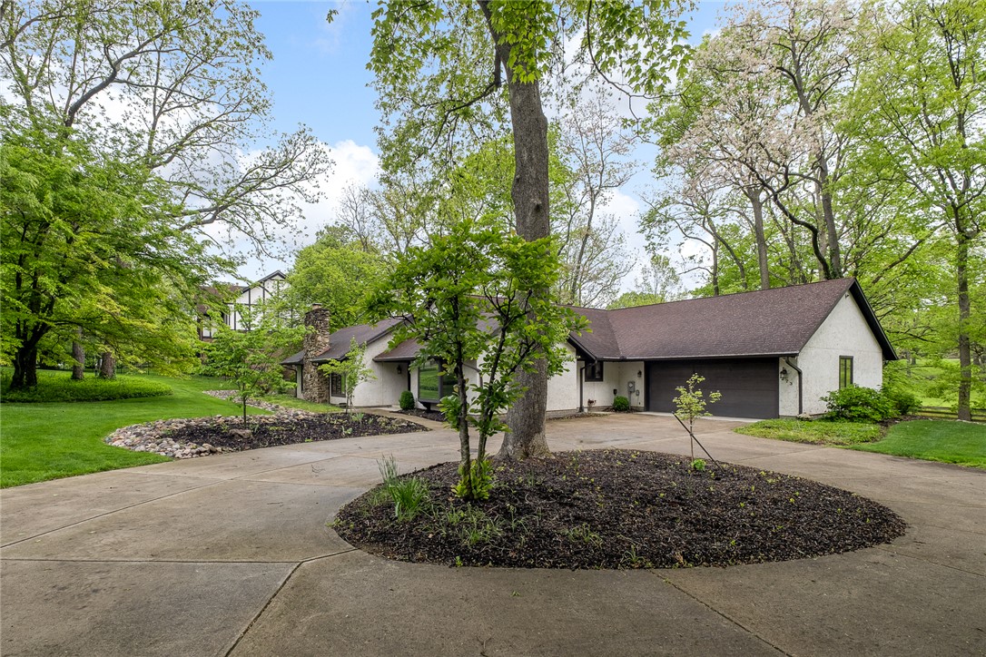 273 North Alpha Bellbrook Road Dayton, OH 45434 - Photo 38 of 43 This beautiful residence is nestled in a serene, treed setting, offering privacy and natural beauty.