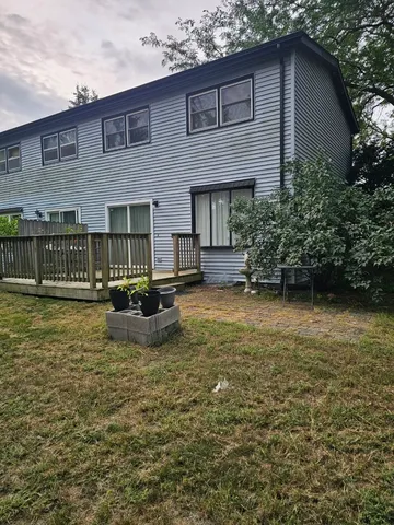 a view of a house with swimming pool