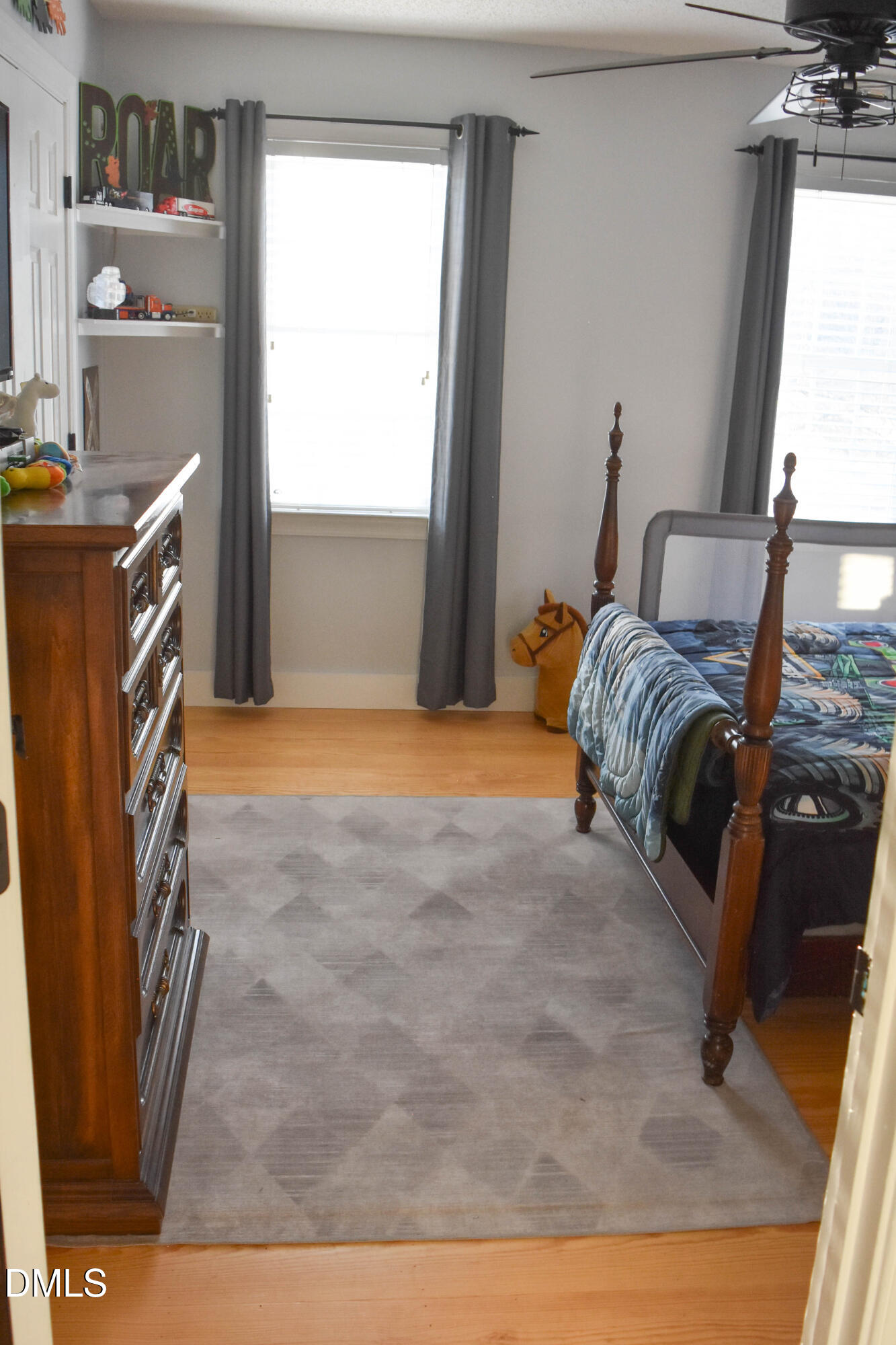 5908 Deep Spring Circle Wake Forest, NC 27587 - Photo 33 of 51 a bed room with a bed and a television