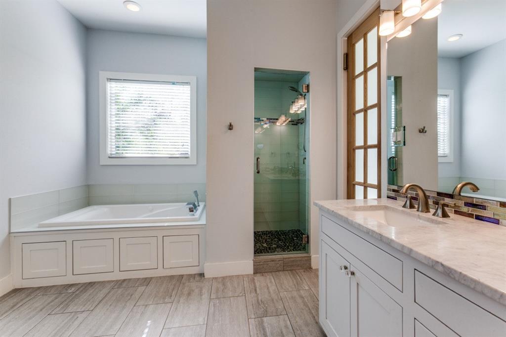 4206 Manning Lane Dallas, TX 75220 - Photo 20 of 35 a bathroom with a sink and a mirror