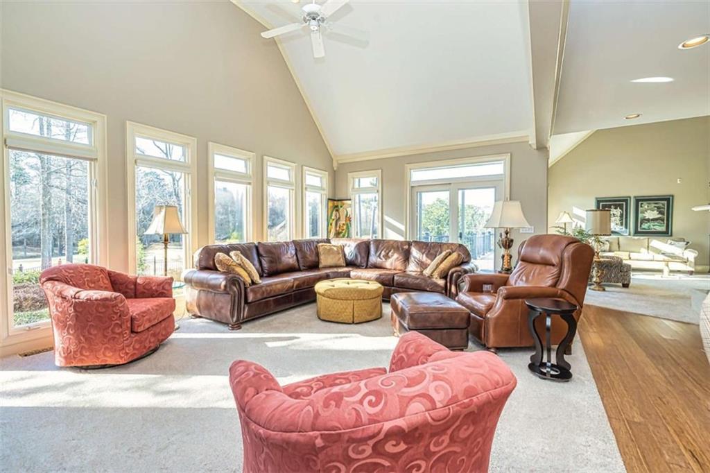35 Torrey Pines Court Newnan, GA 30265 - Photo 26 of 54 a living room with furniture and a large window