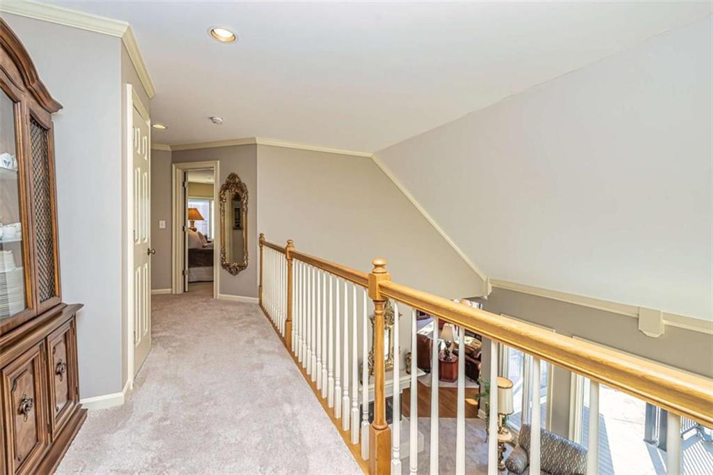 35 Torrey Pines Court Newnan, GA 30265 - Photo 28 of 54 a view of hallway with stairs