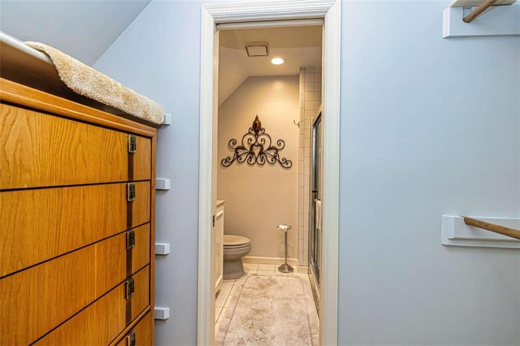 35 Torrey Pines Court Newnan, GA 30265 - Photo 33 of 54 a bathroom with a toilet and a shower