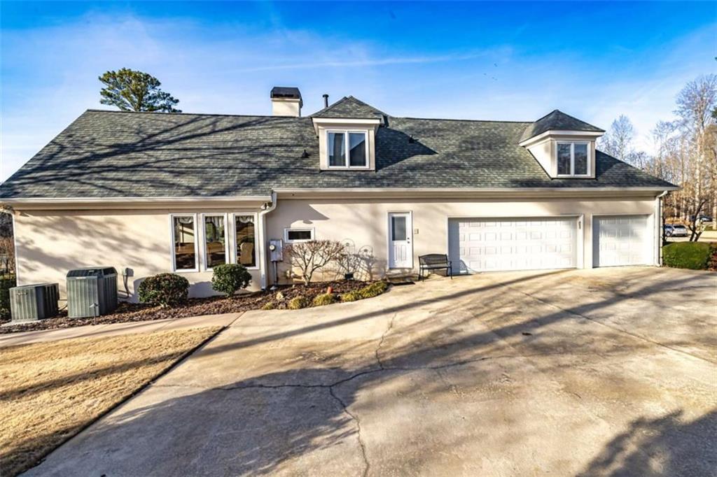 35 Torrey Pines Court Newnan, GA 30265 - Photo 6 of 54 a view of a house with a patio