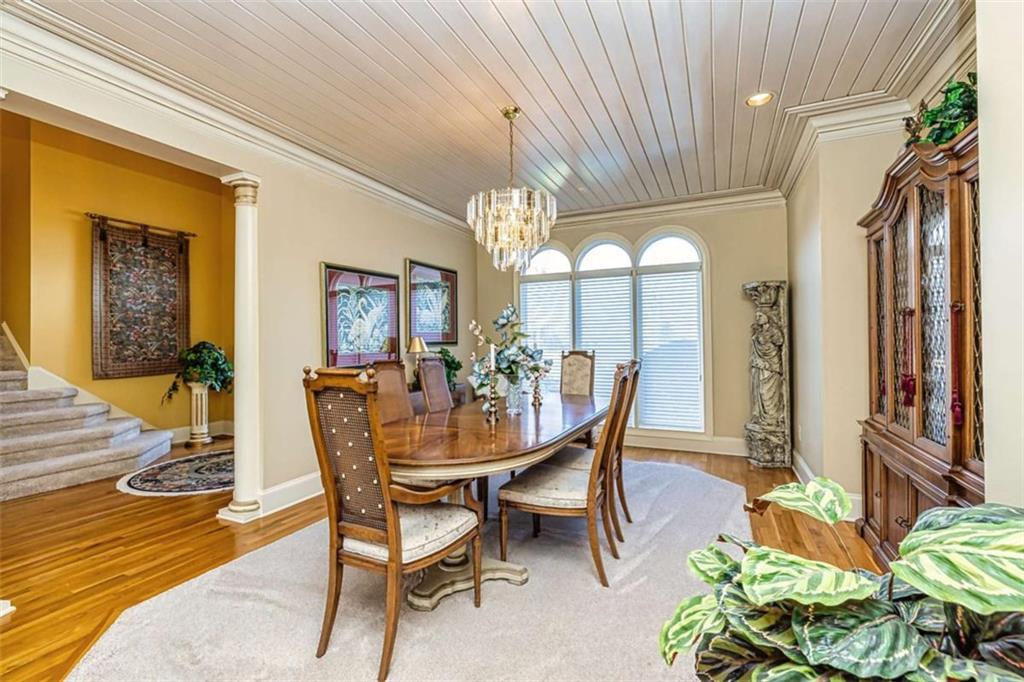 35 Torrey Pines Court Newnan, GA 30265 - Photo 9 of 54 a view of a dining room with furniture window and wooden floor