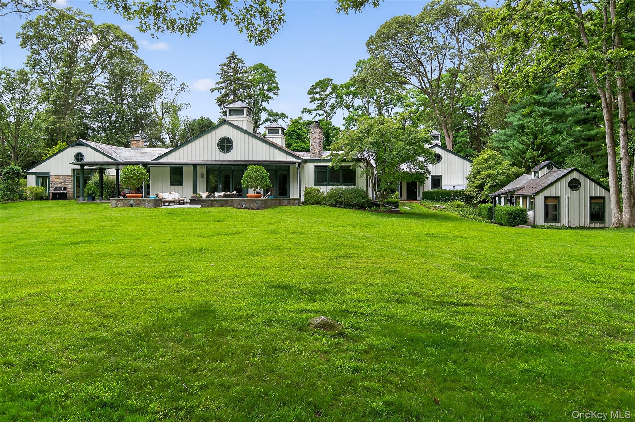 343 Chicken Valley Road Glen Head, NY 11545 - Photo 2 of 49 a front view of a house with garden