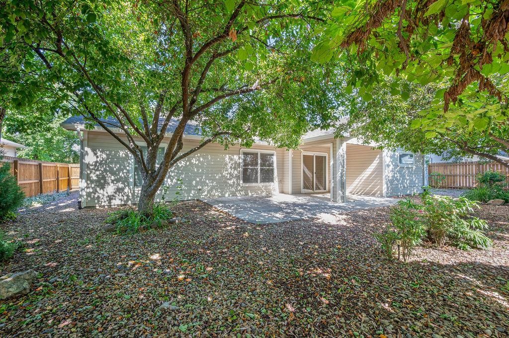 710 Comstock Drive Fruita, CO 81521 - Photo 25 of 25 a view of a house with yard and a tree