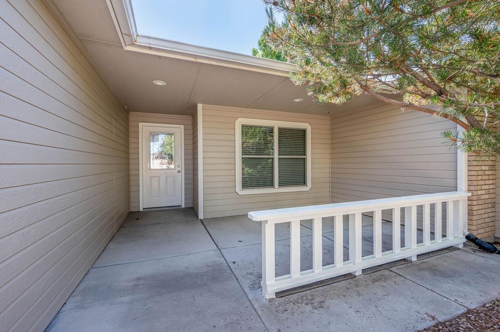 710 Comstock Drive Fruita, CO 81521 - Photo 3 of 25 a view of a house with a porch