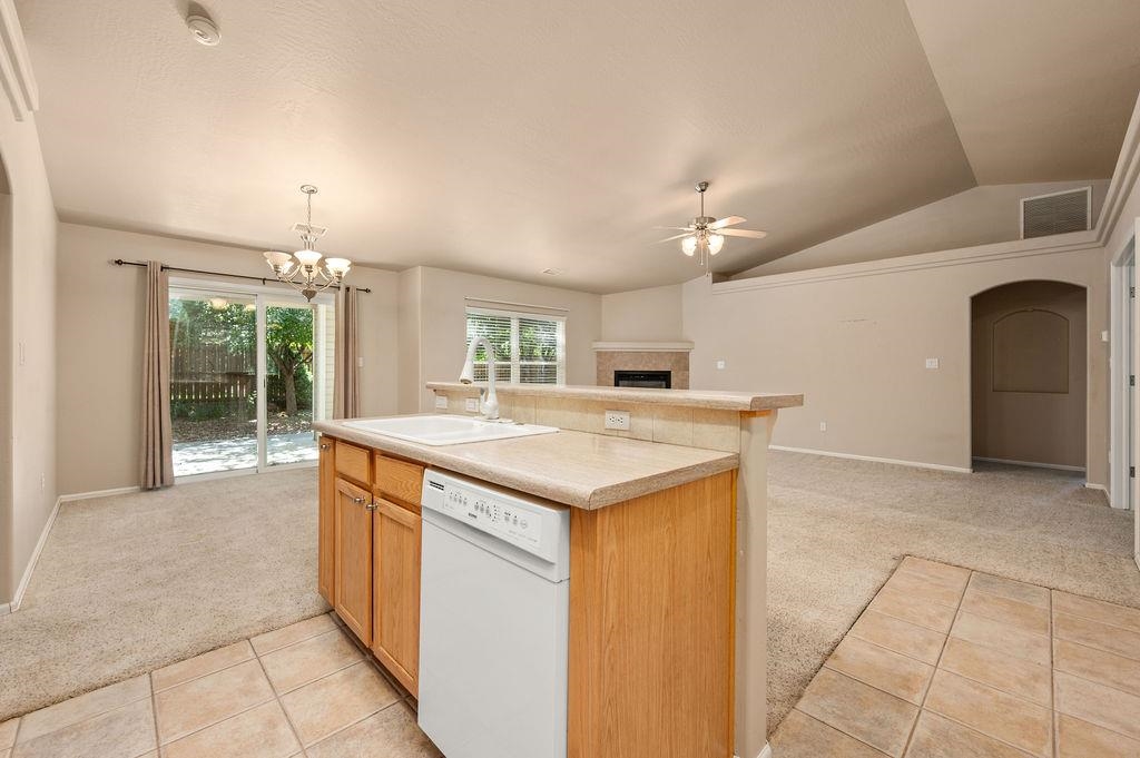 710 Comstock Drive Fruita, CO 81521 - Photo 7 of 25 a spacious bathroom with a granite countertop sink and a mirror