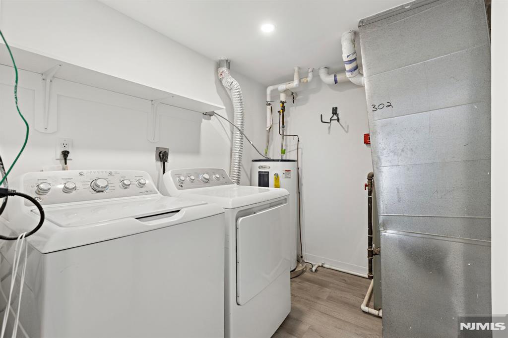 302 Smith Court Edgewater, NJ 07020 - Photo 25 of 34 a utility room with dryer and washer
