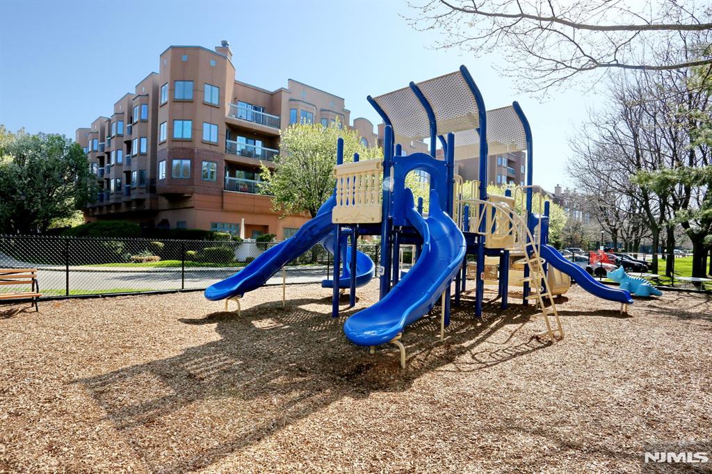 302 Smith Court Edgewater, NJ 07020 - Photo 33 of 34 a view of a park with a slide