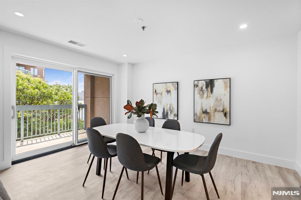 302 Smith Court Edgewater, NJ 07020 - Photo 5 of 34 a view of a dining room with furniture window and outside view