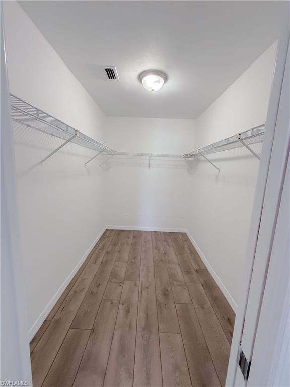 4211 Cindy Avenue Naples, FL 34112 - Photo 20 of 26 a view of a room with wooden floor