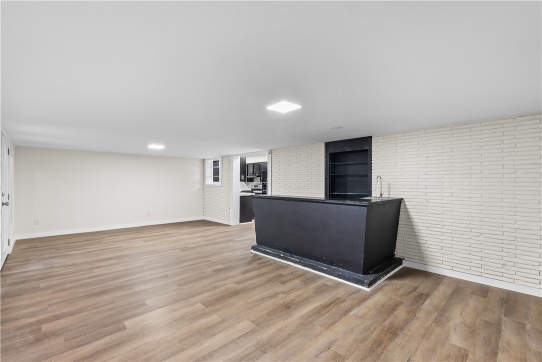 4402 Dolphin Place Corpus Christi, TX 78411 - Photo 15 of 27 a view of empty room with wooden floor