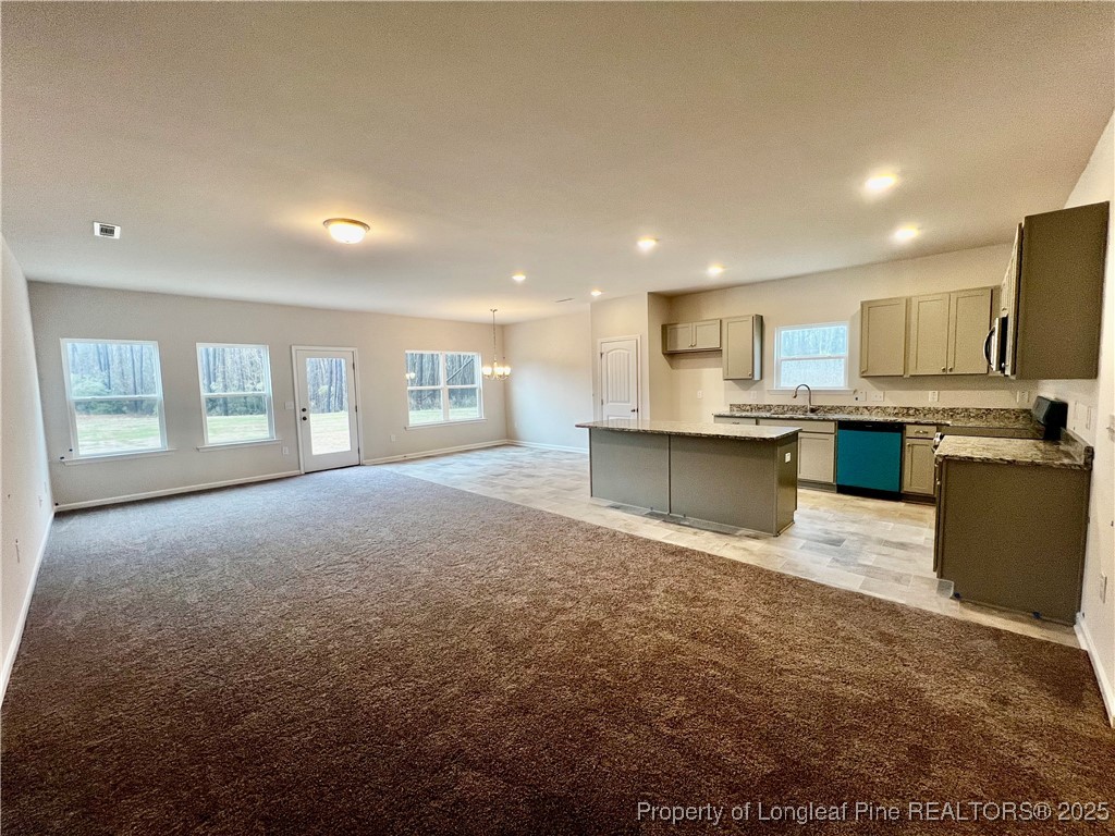1594 Old Barn Road Fayetteville, NC 28312 - Photo 5 of 18 a view of kitchen and windows