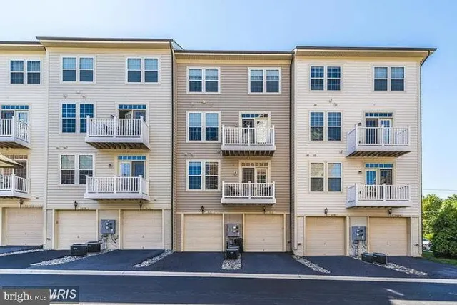 a front view of a building with windows