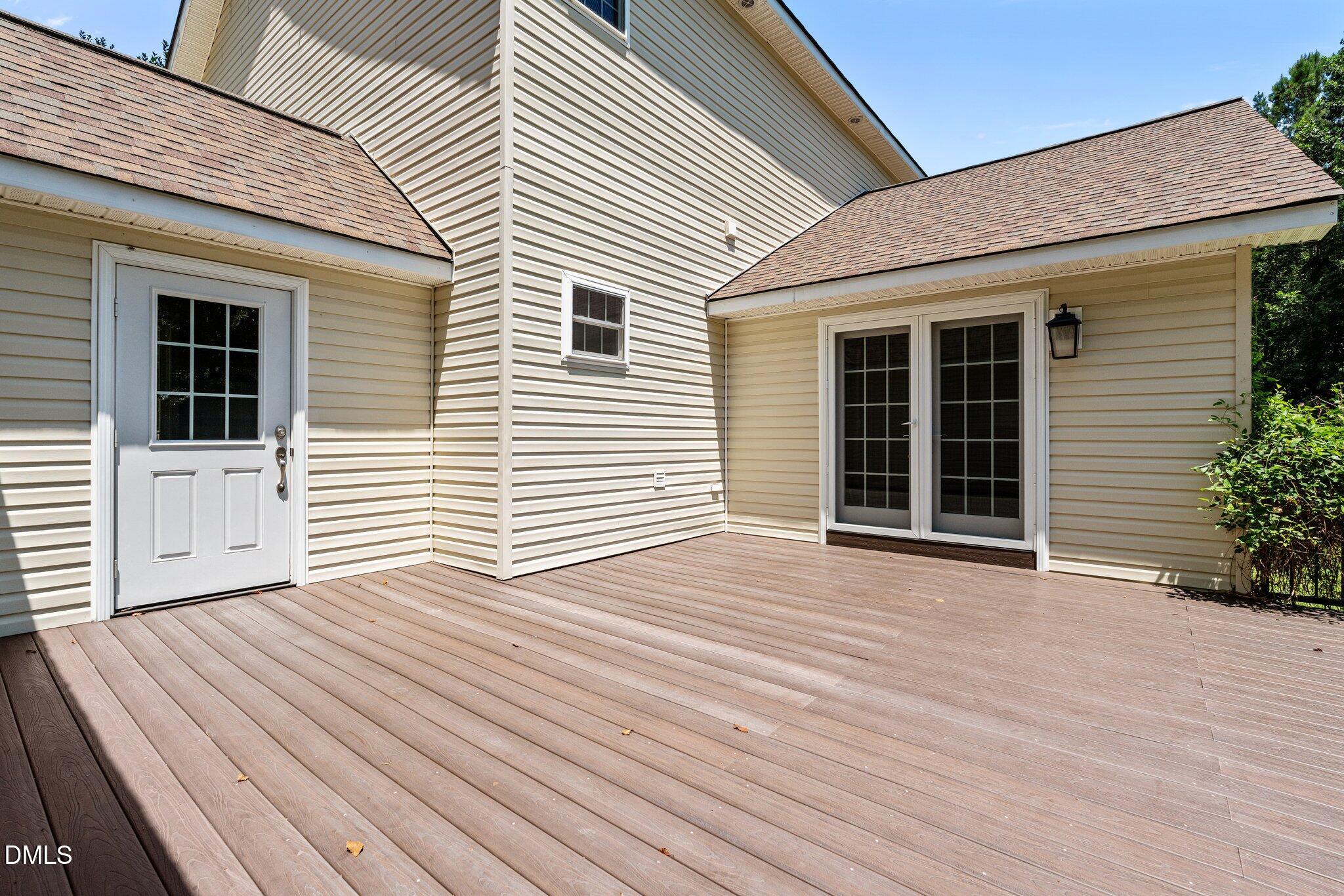 431 Patterson Ridge Lane Sanford, NC 27330 - Photo 29 of 29 a view of a house with a roof deck